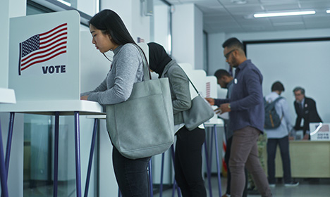 people voting at a polling place