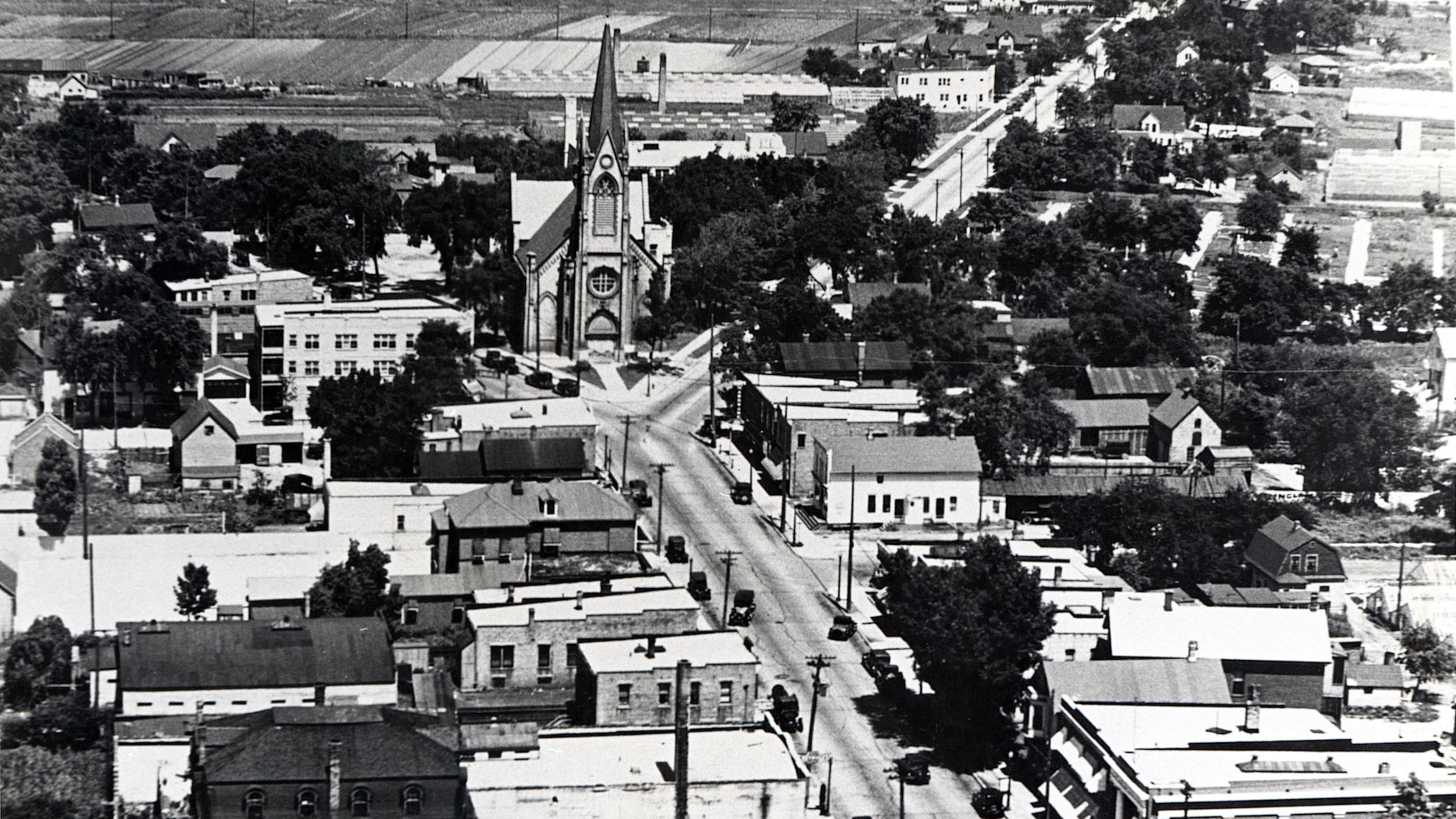 black and white photo of a birds eye view of Niles Center Road split